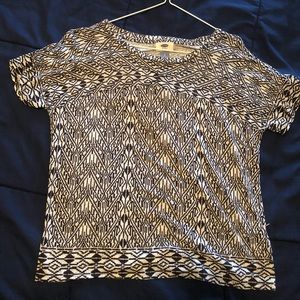 Short sleeved patterned shirt.